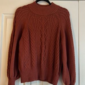 Burnt orange turtleneck sweater